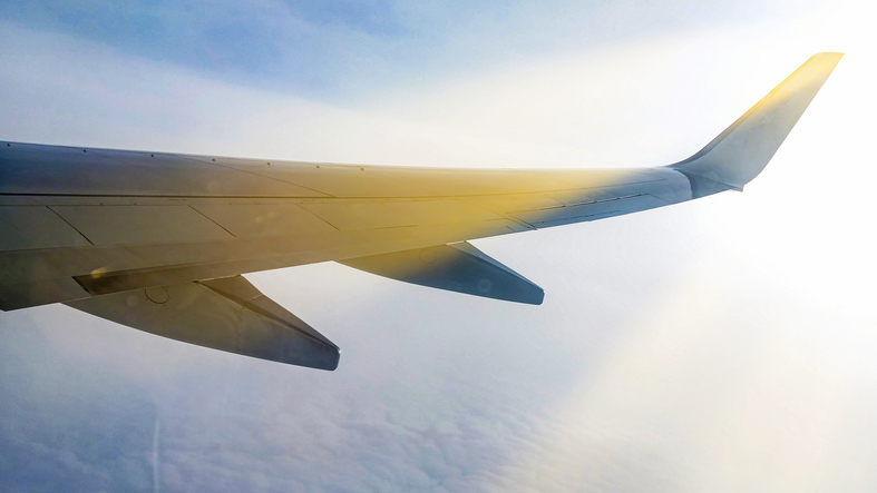 Sunset sky on airplane window