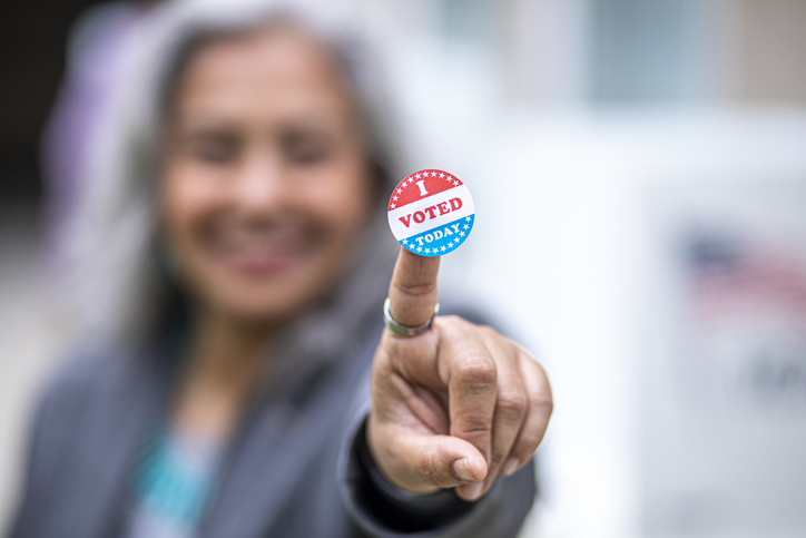 Senior Mexican Woman with I Voted Sticker