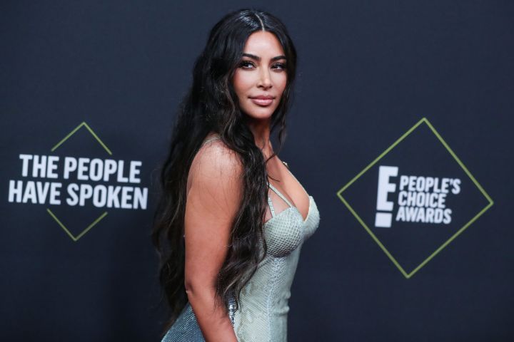 Kim Kardashian West wearing Versace arrives at the 2019 E! People&apos;s Choice Awards held at Barker Hangar on November 10, 2019 in Santa Monica, Los Angeles, California, United States.