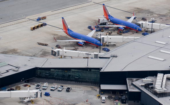 Southwest Boeing 737 airplanes sit at th