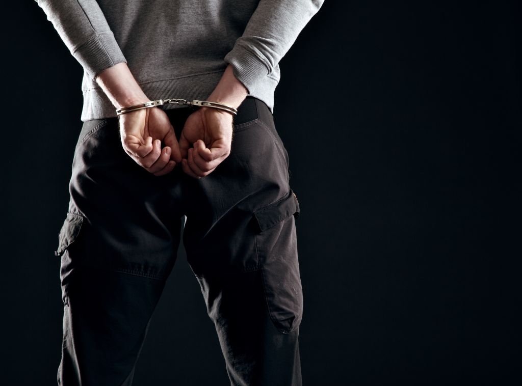 Man Arrested in Handcuffs