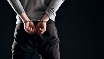 Man Arrested in Handcuffs