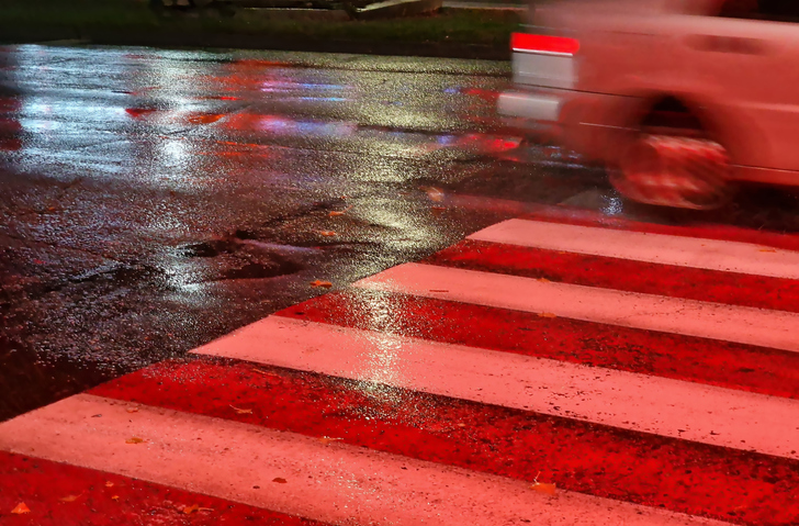 crossing for pedestrians in the rain
