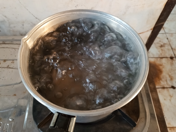 Boiled water in a pan
