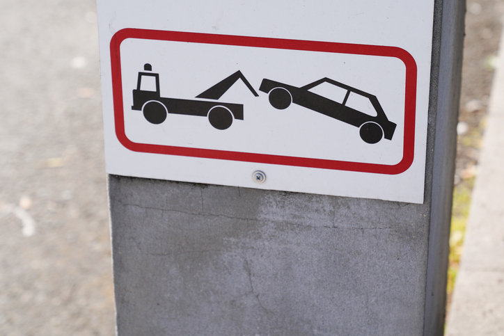 Sign evacuation of car to impound No parking any time Punishment symbol