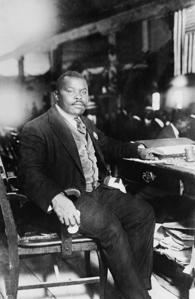 Jamaica: Marcus Garvey (1887-1940), Pan Africanist and Jamaican national hero, seated at his desk, 5 August 1924